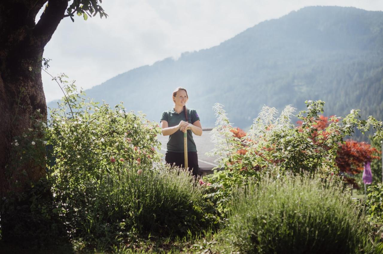 Imlauer Hotel Schloss Pichlarn Айген-ім-Енсталь Екстер'єр фото A woman working in the botanical garden